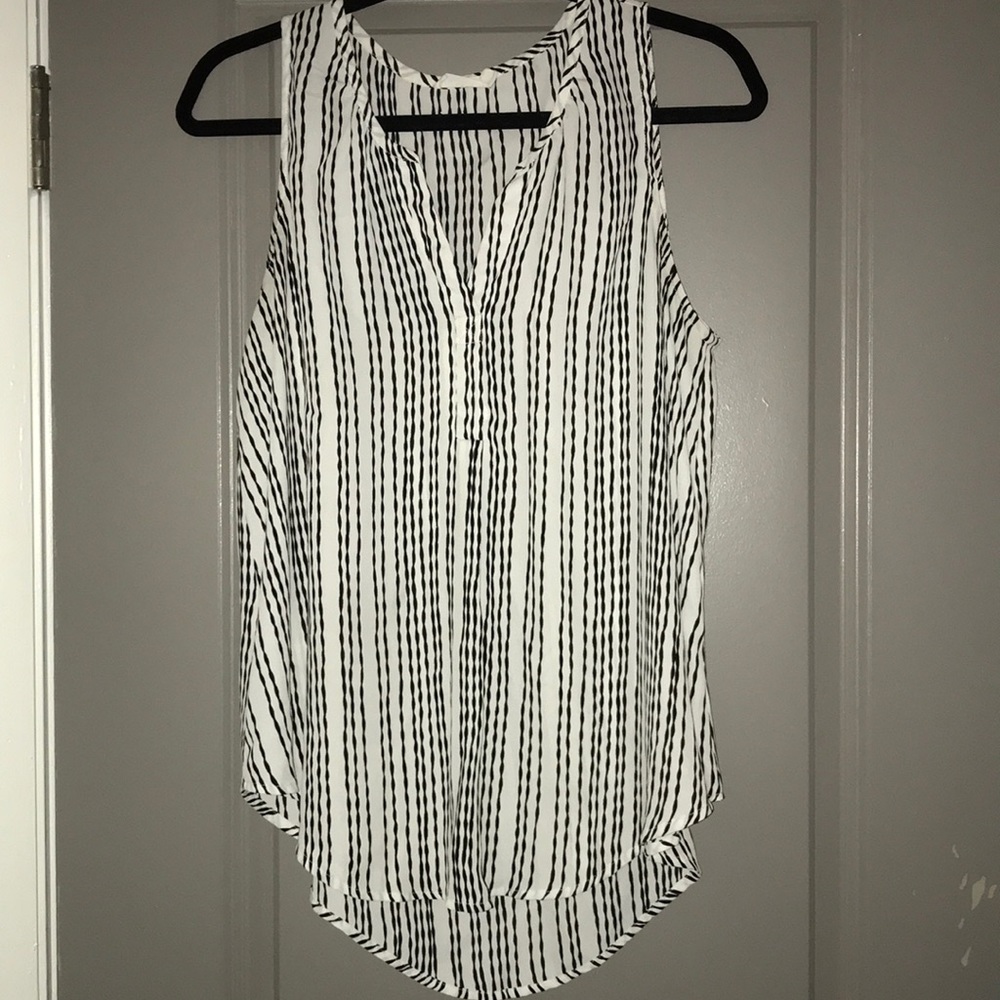 Sleeveless black and white blouse